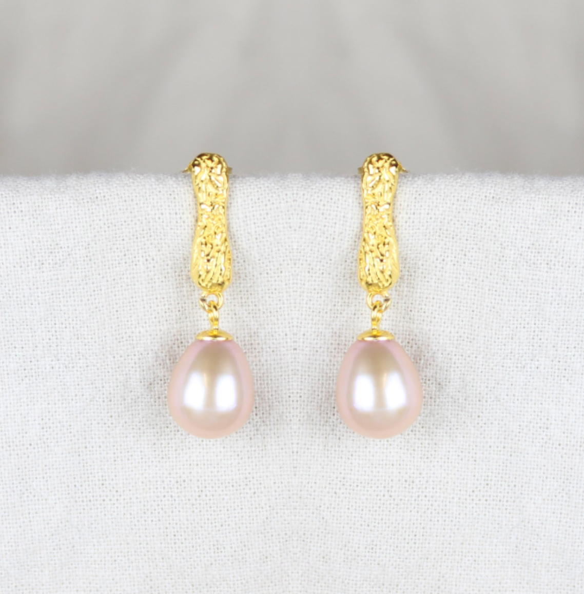 Aflange rustikke rosa perleøreringe