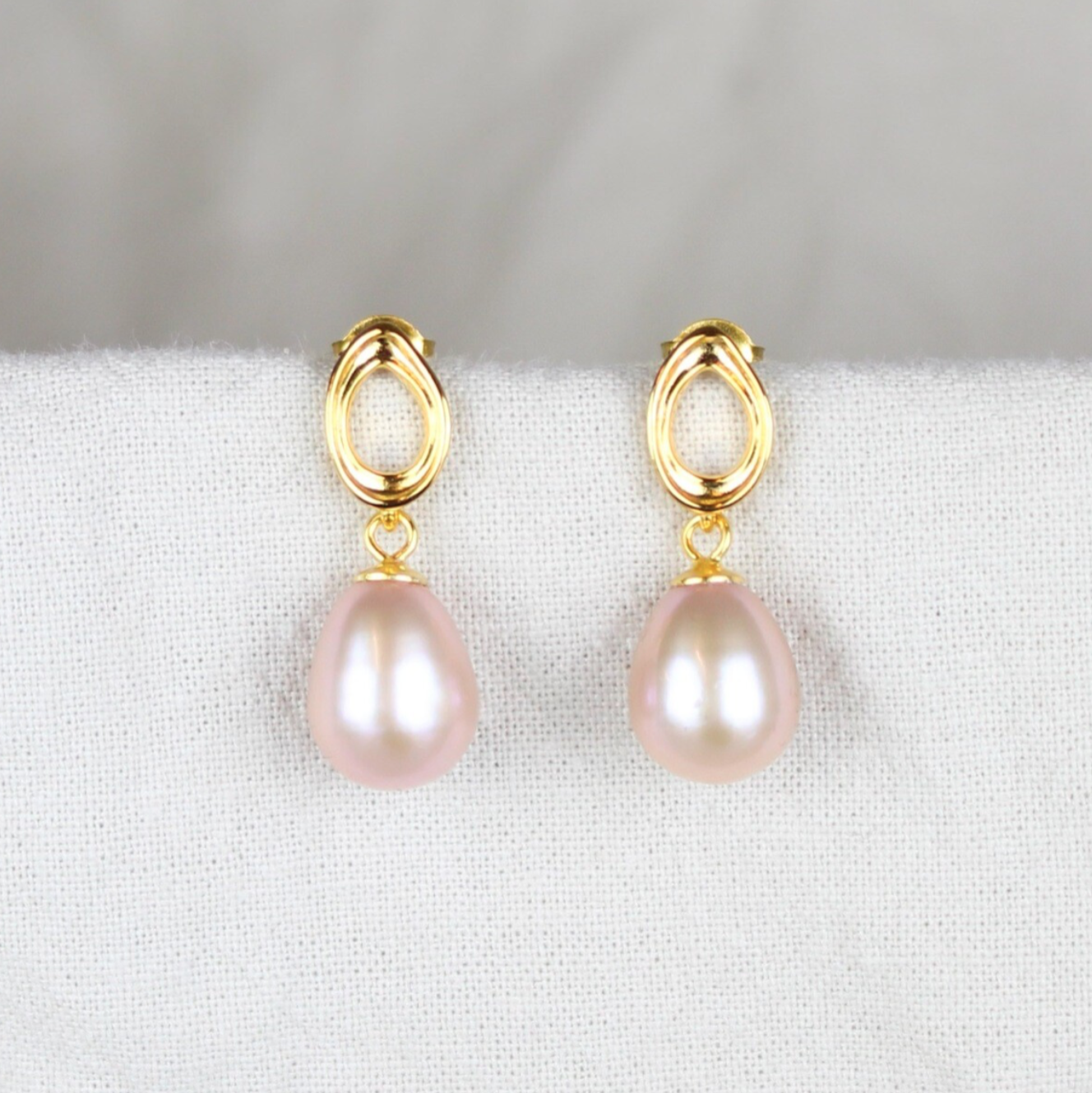 Ovale rosa perleøreringe