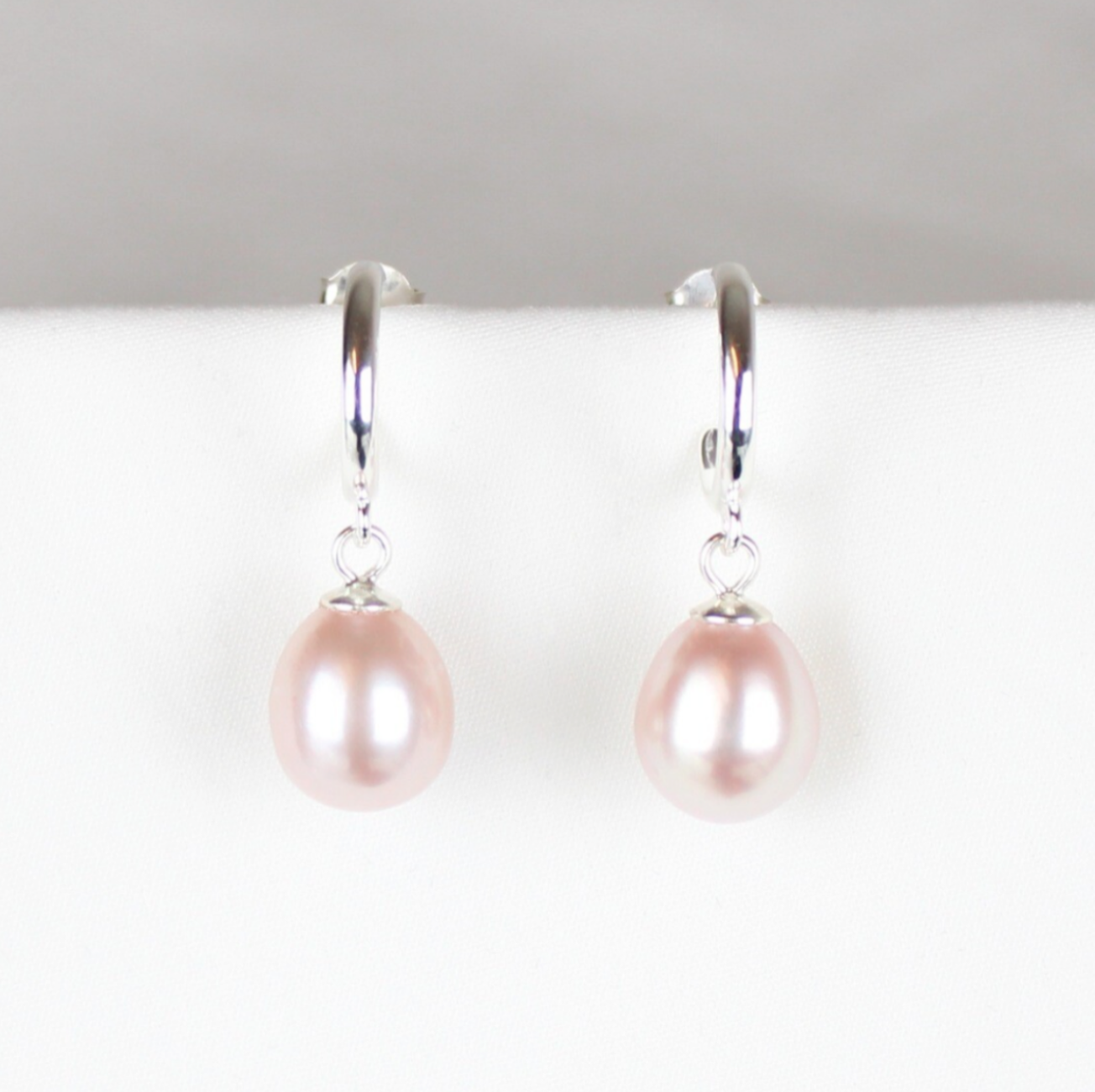 Creoler med rosa ferskvandsperler