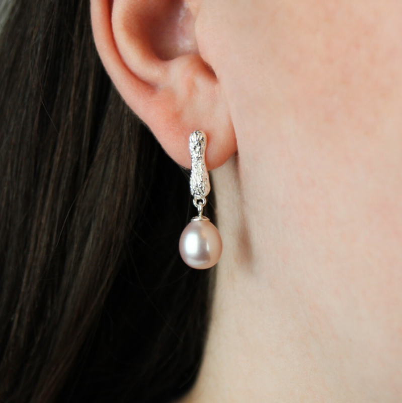 Aflange rosa perleøreringe