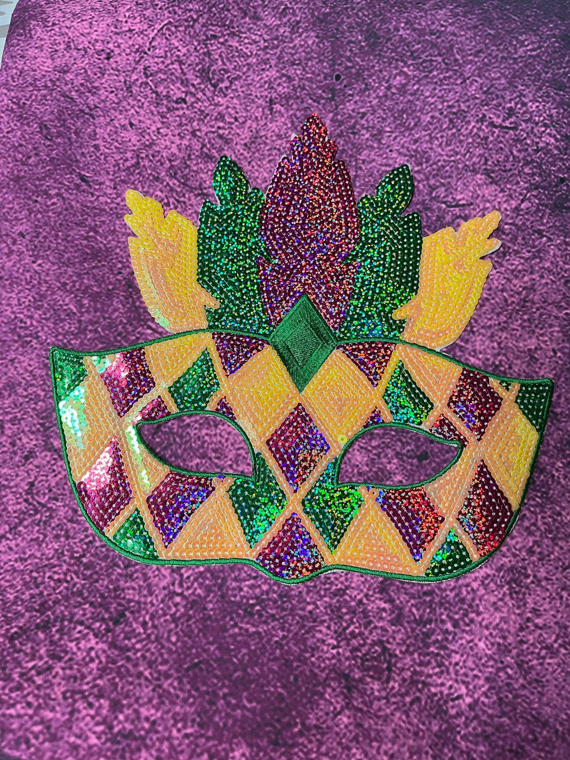 Shimmering Masquerade: All-Sequin Mardi Gras Feather Mask Patch