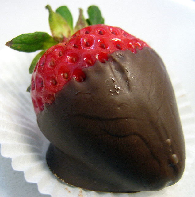 Dip chilled strawberries in warmed chocolate and watch it harden in front of you!