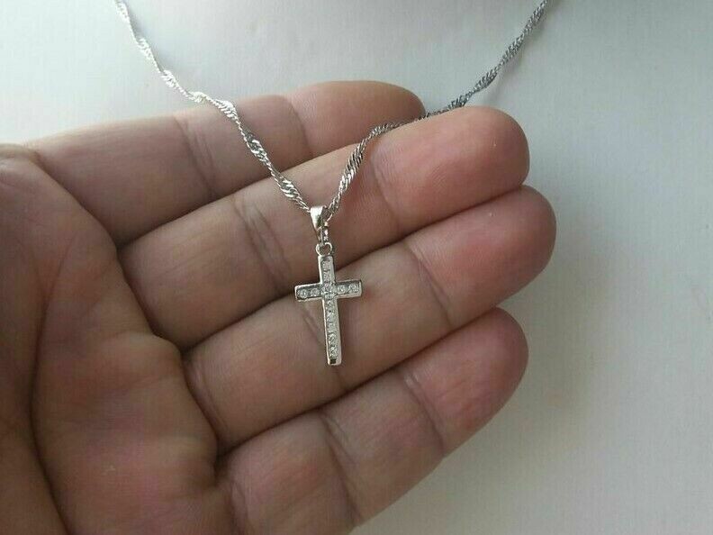 Top! Weißgold hart vergoldetes Kreuz mit Steinen besetzt.