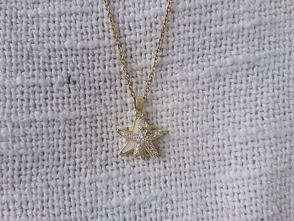 Doppelter Seestern vergoldet mit Steinen verziert Doppelter Seestern vergoldet mit Steinen verziert