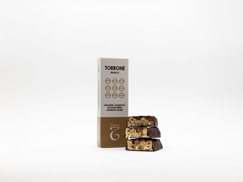 White almond nougat covered with caramel chocolate 100g White almond nougat covered with caramel chocolate 100g