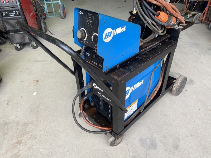 MILLER XMT350-70 SERIES FEEDER. NO GUN OR REG - USED