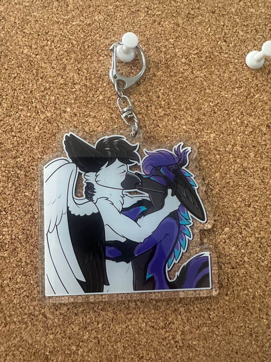 Ender kissing a griff keychain
