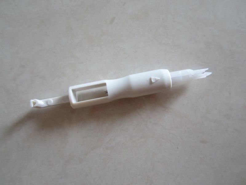 Sewing machine needle threader &amp; holder