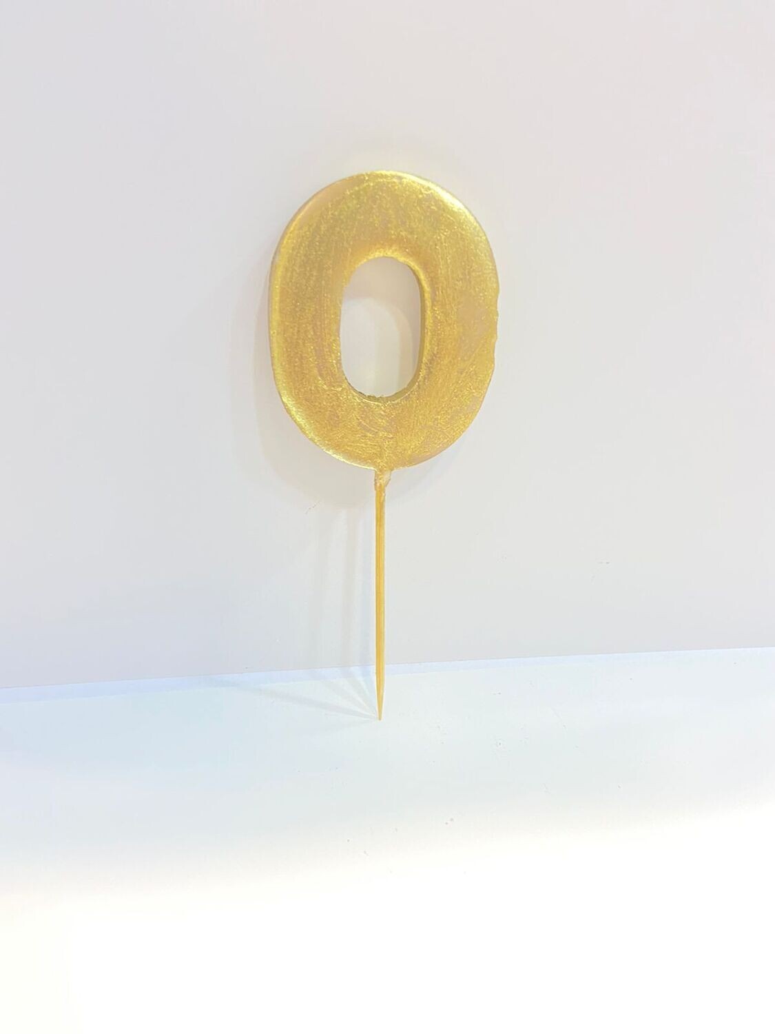 Цифра "0" АНТИЧНАЯ (золотая) на шпажке, из шоколадной глазури