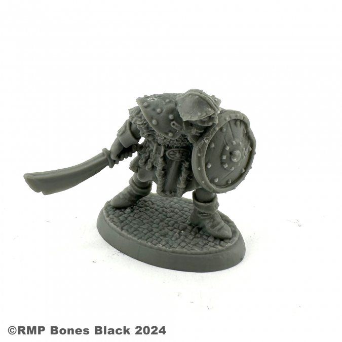 Orc Warrior (Sword Down) - Bones Black - Reaper Miniatures Orc Warrior (Sword Down) - Bones Black - Reaper Miniatures