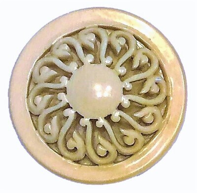A LARGE SIZE LACY CREAM CELLULOID BUTTON