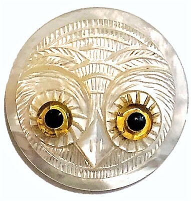 A LARGE SIZE CARVED PEARL OWL WITH GLASS EYES