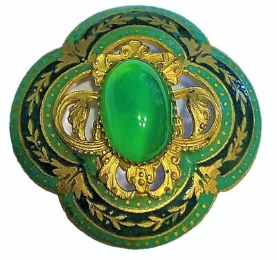 A LARGE PIERCED GILDED BRASS ENAMEL JEWELED BUTTON