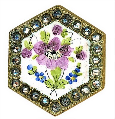 A LARGE 6 SIDED POLYCHROME ENAMEL BUTTON