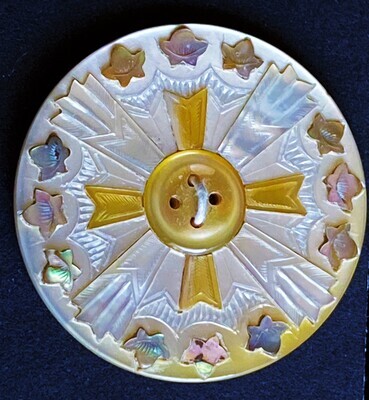 A LARGE INLAYED MOTHER OF PEARL SEW THRU CROSS BUTTON