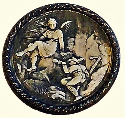 A LARGE FIGURAL IVOROID BUTTON