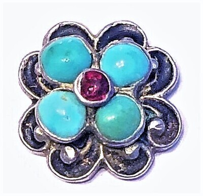 A SMALL TURQUOISE AND GARNET BUTTON