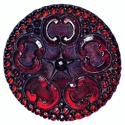 A LARGE FULL BODY RED LACY GLASS BUTTON