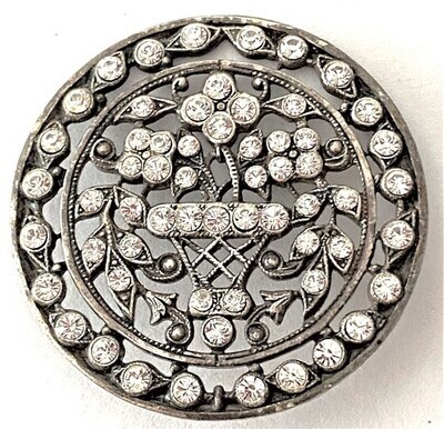 AN EXTRA LARGE PIERCED SILVER AND ALL OVER PASTE BASKET BUTTON
