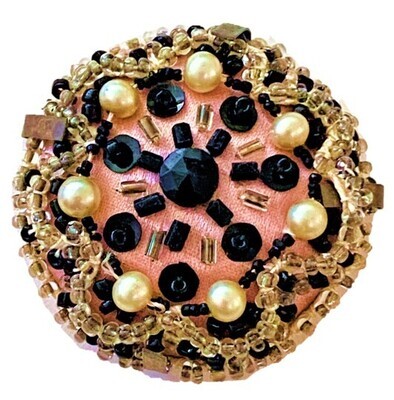 AN EXQUISITELY CREATED 19TH CENTURY BEADED FABRIC BUTTON
