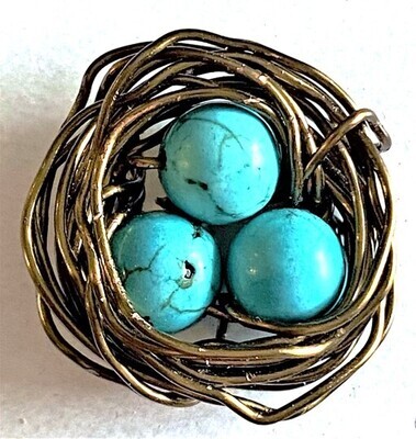 A VERY COOL TURQUOIS AND BRASS NEST AND EGGS BUTTON