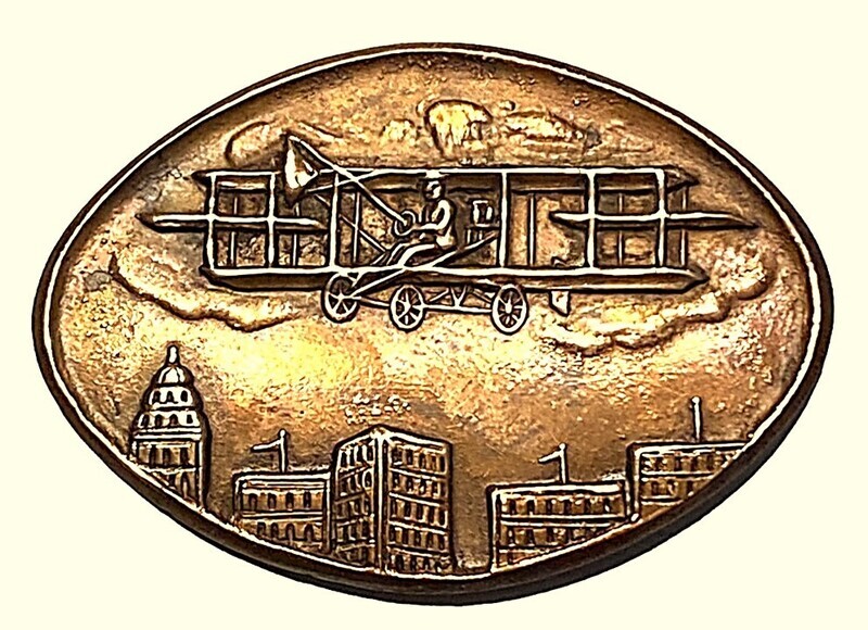 A SCARCE "WRIGHT BROTHERS" STYLE AIRPLANE PICTORIAL BUTTON