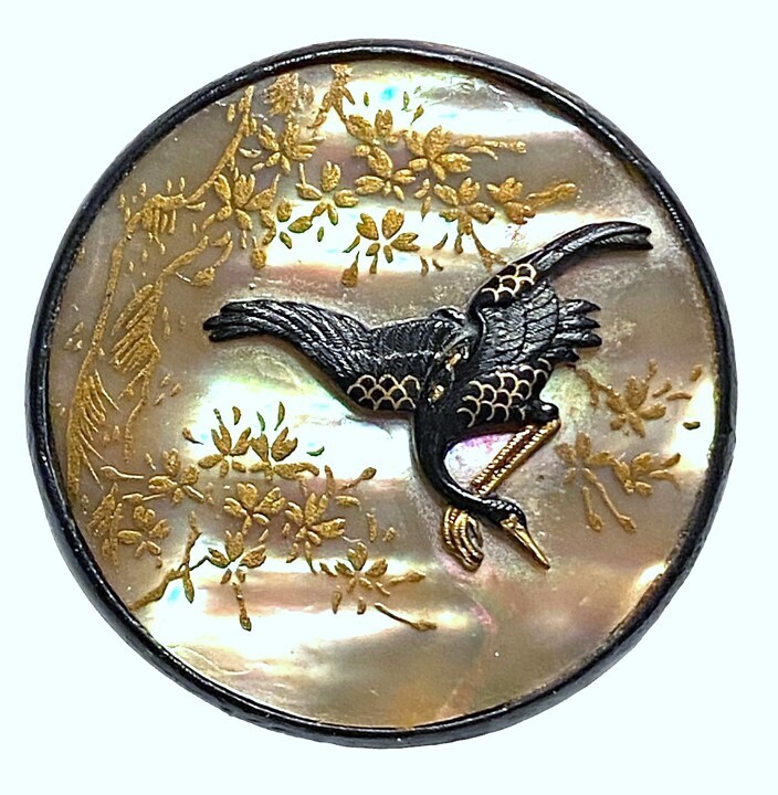 A RARE JAPANESE METAL WORKS PEARL BACKGROUND BUTTON.