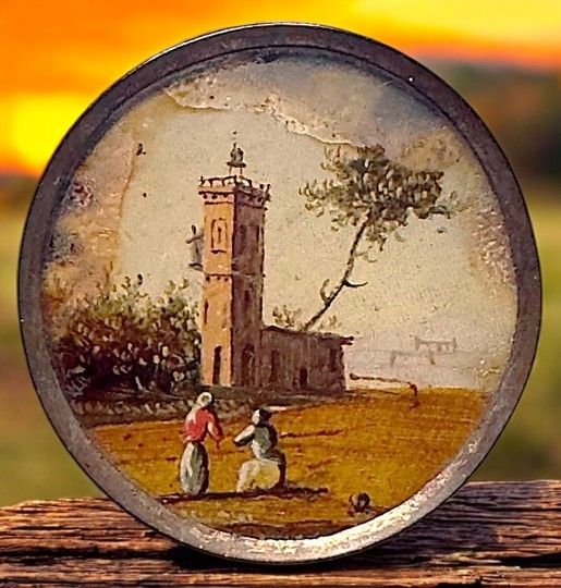 A wonderful 18th century reverse painted glass scene button!
