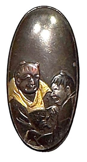 A rare large oval Shakudo button!