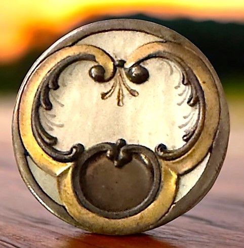 An unusual 19th century metal overlay pearl button!
