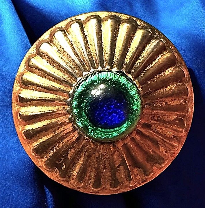 A striking large Peacock Eye glass in metal button!