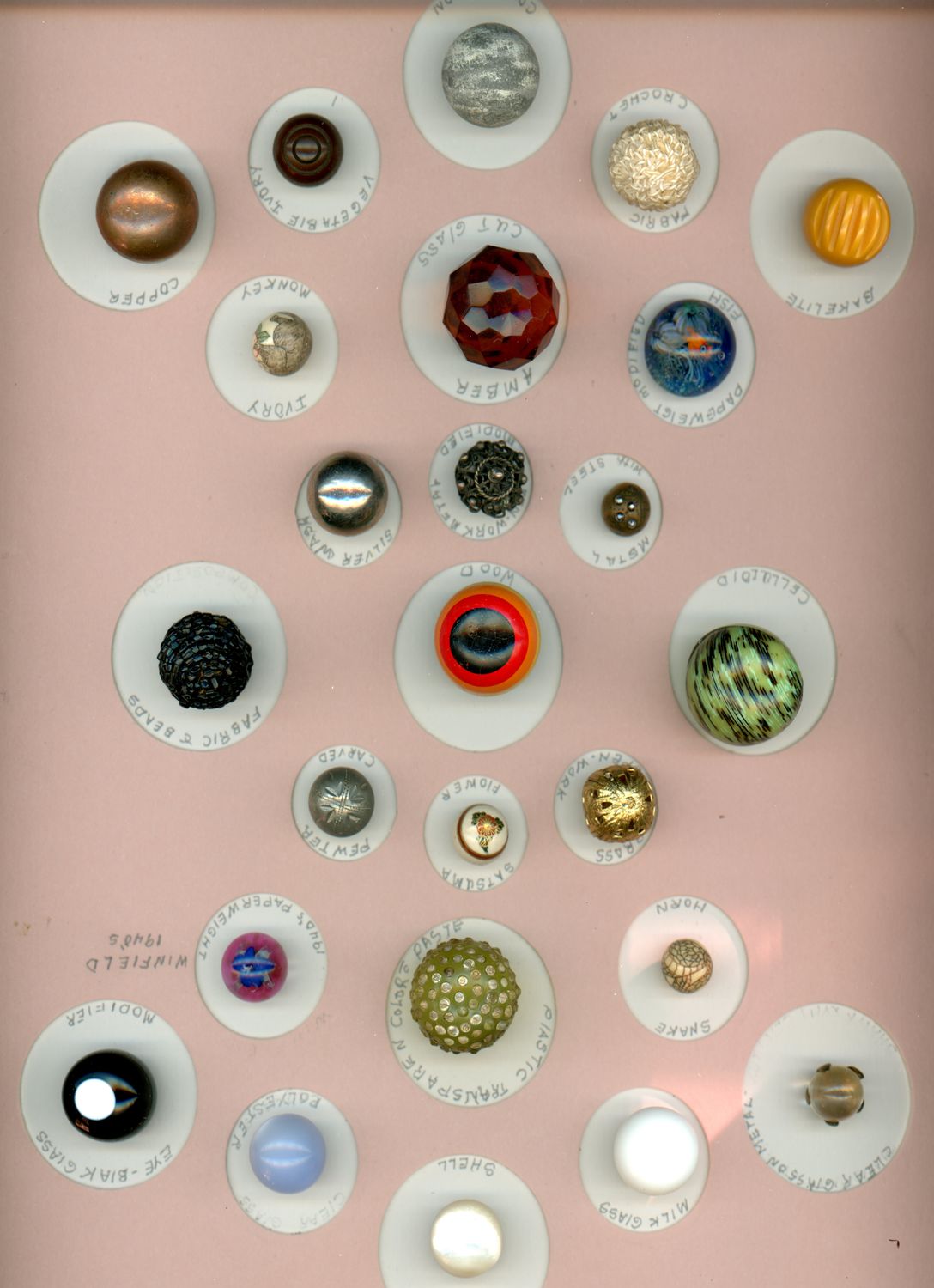 A card of Beautiful ball buttons including Paperweight and Satsuma