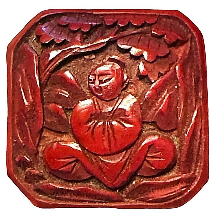 A large square OLD Figural Cinnabar button!