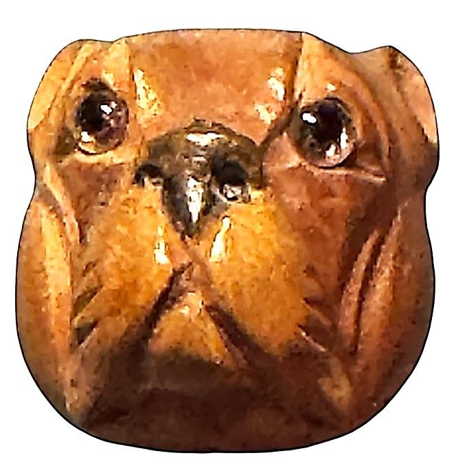A fabulous hand carved realistic dog head with glass eyes!