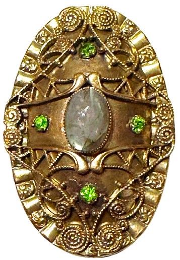 A wonderful Large oval Gay 90 jeweled button!