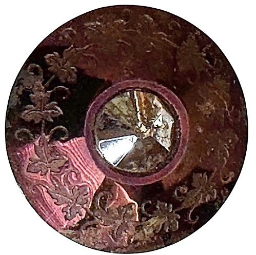 A scarce medium purple tint steel on steel button!