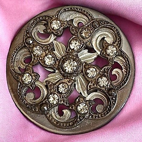 An exquisite division one pierced pearl button!