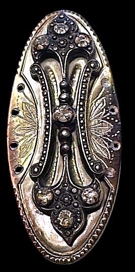 A magnificent large Oval engraved pearl button.
