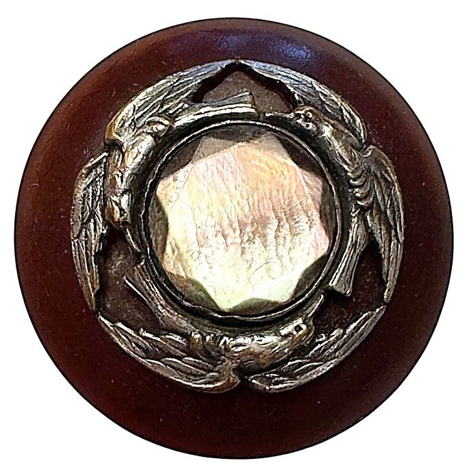 A wonderful tri design on Cherry colored horn button!
