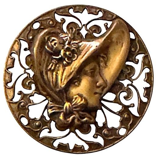 An extra-large brass openwork pictorial button!