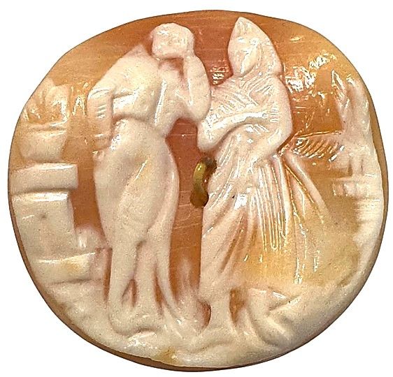A large natural carved shell cameo of a couple!