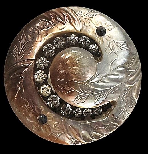 A very cool large paste OME carved and engraved pearl button