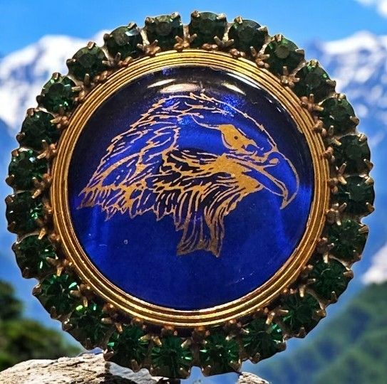 A stunning cobalt blue glass lustered eagle with green paste border!
