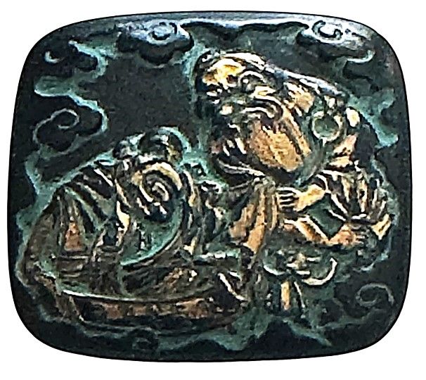 A large molded black glass pictorial button!