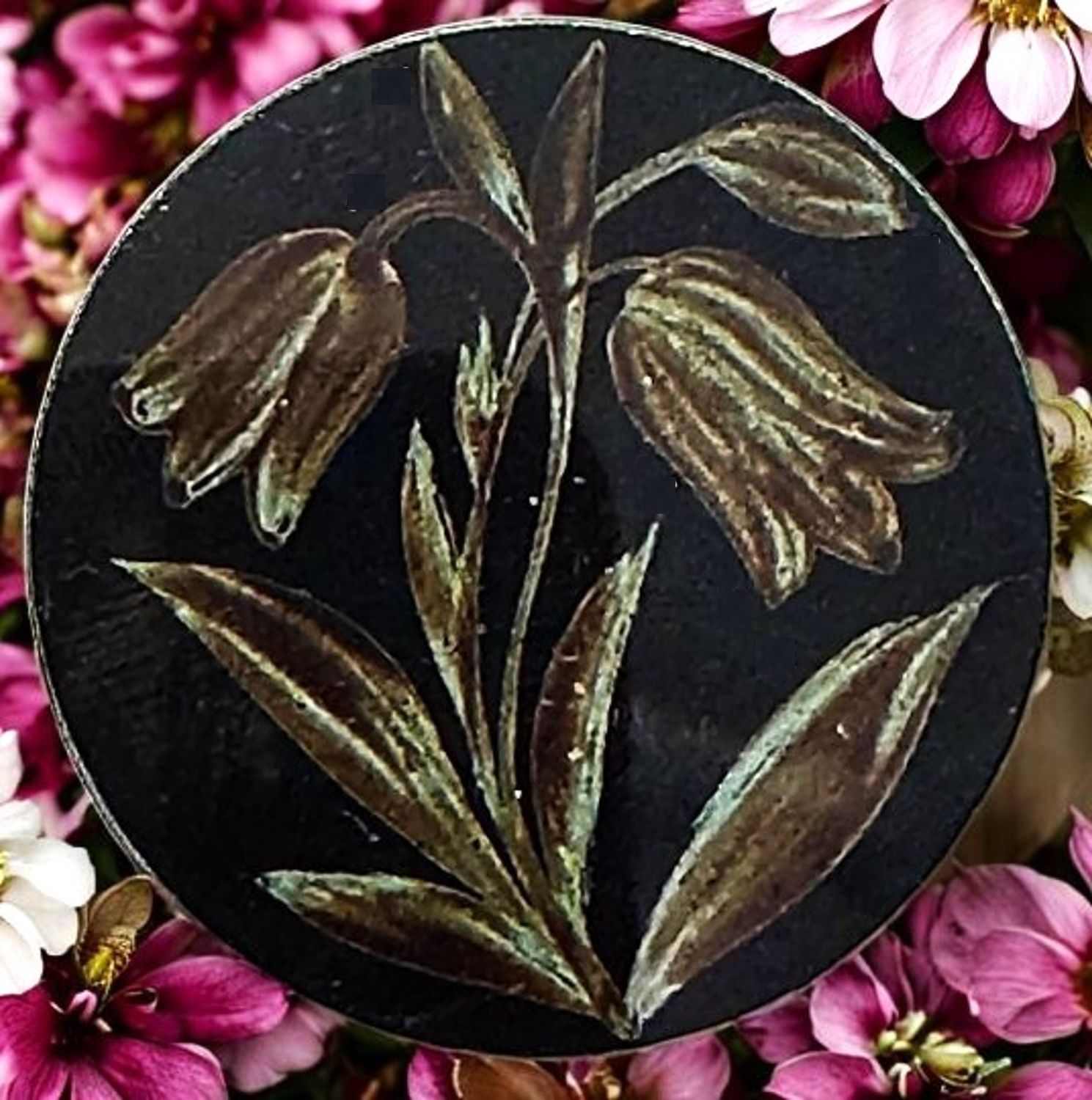A Rare division one black glass pictorial button!