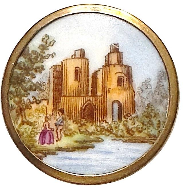 A beautiful 19th century hand painted porcelain in metal button!