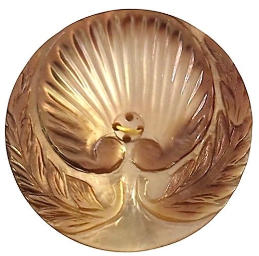 A very large 19th century carved and shaded pearl button!