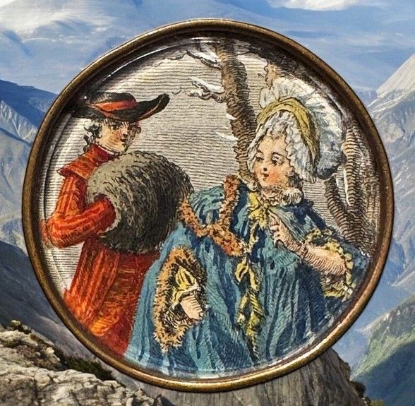 A beautiful and scarce 19th century hand colored Litho under glass button!