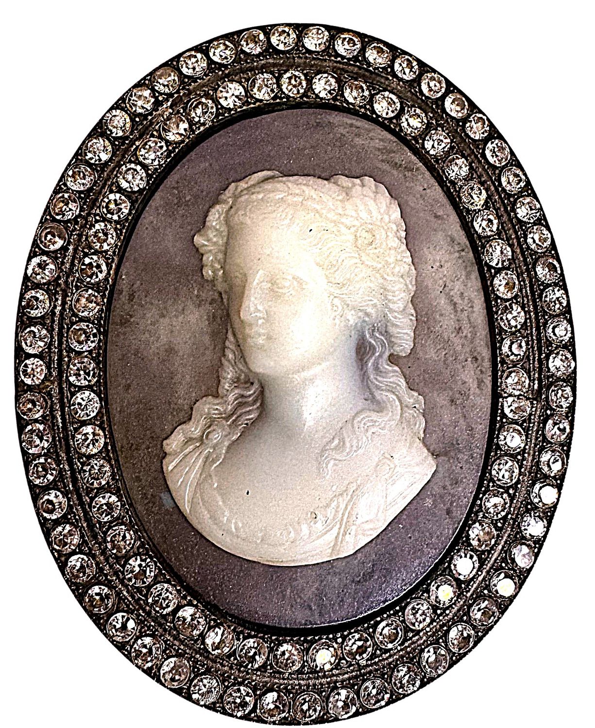 A very RARE extra large Oval glass in metal with paste border.