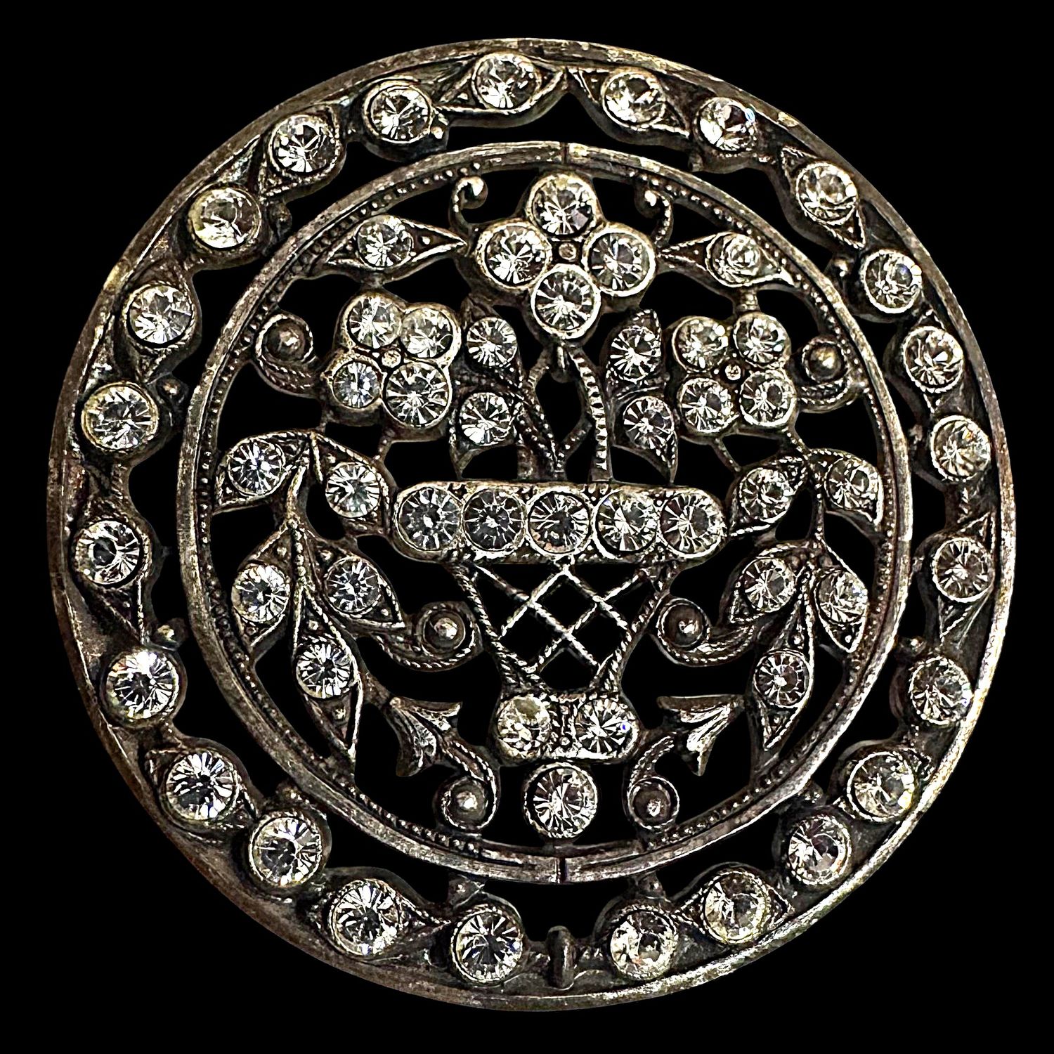 A large pierced silver and all over paste Basket Button!
